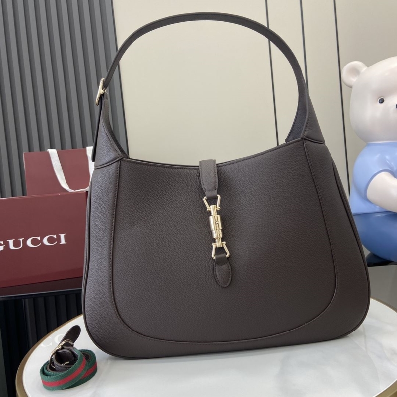 G*u*i top handle bags